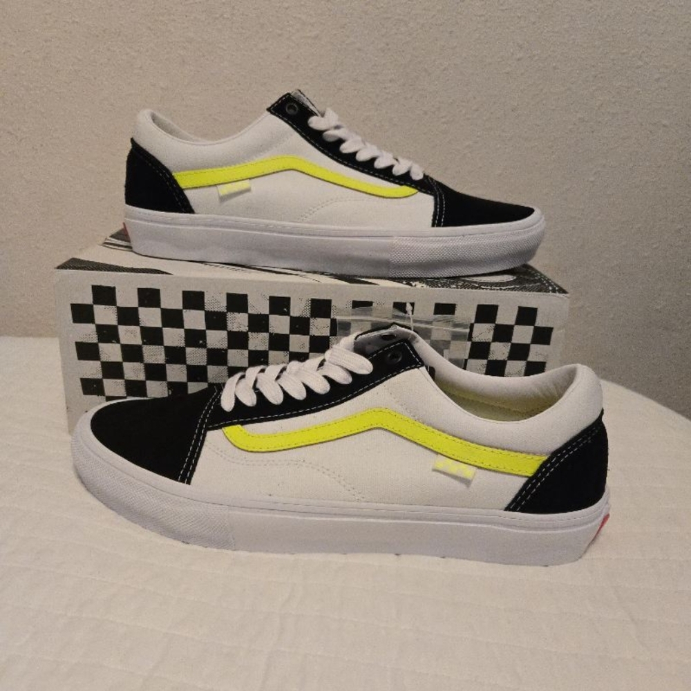 Vans Black and White Sneakers with Yellow Stripe